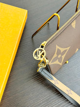 Load image into Gallery viewer, LOUIS VUITTON 2023 Monogram Giant Rectangular Wristlet Pouch