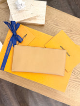 Load image into Gallery viewer, LOUIS VUITTON 2024 Empreinte Leather Card Holder in Arizona