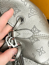 Load image into Gallery viewer, LOUIS VUITTON 2023 Bella Mahina Leather Bucket Bag in Gray Metallic