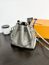 Load image into Gallery viewer, LOUIS VUITTON 2023 Bella Mahina Leather Bucket Bag in Gray Metallic