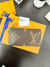 Load image into Gallery viewer, LOUIS VUITTON 2023 Monogram Giant Rectangular Pouch