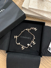 Load image into Gallery viewer, CHANEL CC Chain Anklet Bracelet Metal with Faux Pearl in Gold & Pearly White