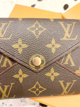 Load image into Gallery viewer, LOUIS VUITTON 2021 Monogram Pochette Kirigami Medium Pouch