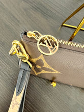 Load image into Gallery viewer, LOUIS VUITTON 2020 Monogram Giant Rectangular Wristlet Pouch
