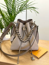 Load image into Gallery viewer, LOUIS VUITTON 2024 Muria Mahina Leather Bucket Bag in Galet Gray
