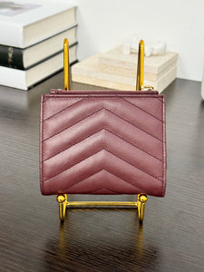 SAINT LAURENT Cassandre Matelasse Embossed Leather Bi-Fold Wallet in Burgundy