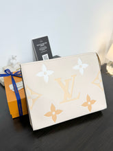 Load image into Gallery viewer, LOUIS VUITTON 2021 Monogram Empriente Leather Toiletry Pouch 26 in Cream Saffron
