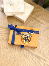 Load image into Gallery viewer, LOUIS VUITTON 2022 Puzzle Flower Monogram Keyring
