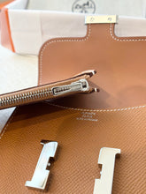 Load image into Gallery viewer, Hermès Constance Slim Wallet Gold Epsom / Silver Hardware
