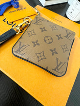 Load image into Gallery viewer, LOUIS VUITTON 2023 Monogram Reverse Square Wristlet Pouch
