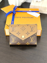 Load image into Gallery viewer, LOUIS VUITTON Monogram Reverse Victorine Wallet
