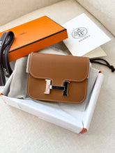 Load image into Gallery viewer, Hermès Constance Slim Wallet Gold Epsom / Silver Hardware
