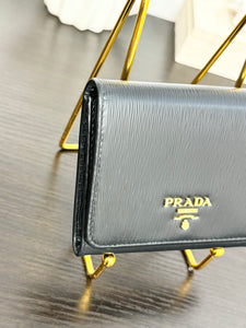 PRADA Vitello Move Trifold Wallet in Black