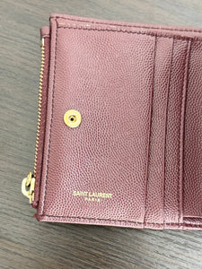 SAINT LAURENT Cassandre Matelasse Embossed Leather Bi-Fold Wallet in Burgundy