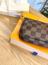 Load image into Gallery viewer, LOUIS VUITTON Damier Ebene Canvas Mini Pochette Accessoires
