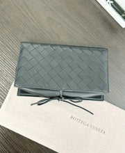 Load image into Gallery viewer, BOTTEGA VENETA Nappa Intrecciato Tie Clutch in Black
