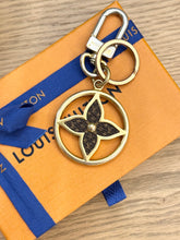 Load image into Gallery viewer, LOUIS VUITTON 2022 Puzzle Flower Monogram Keyring
