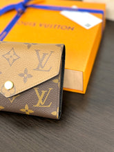 Load image into Gallery viewer, LOUIS VUITTON Monogram Reverse Victorine Wallet
