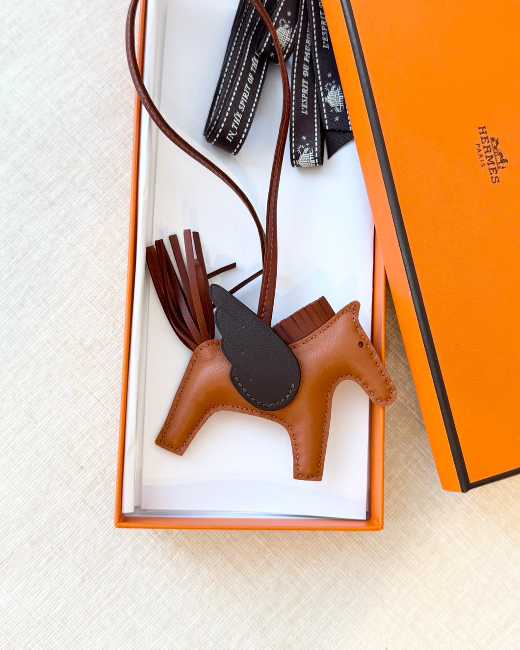 HERMES 2024 Rodeo Pegase PM Bag Charm in Pain D'Epice/Sienne/Mocha