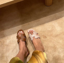 Load image into Gallery viewer, Hermes Embroidered Calfskin Oran Sandals / Gold / (EU)38
