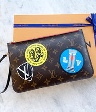 Load image into Gallery viewer, Louis Vuitton World Tour Neverfull MM Monogram Pochette Wristlet Pouch In Red
